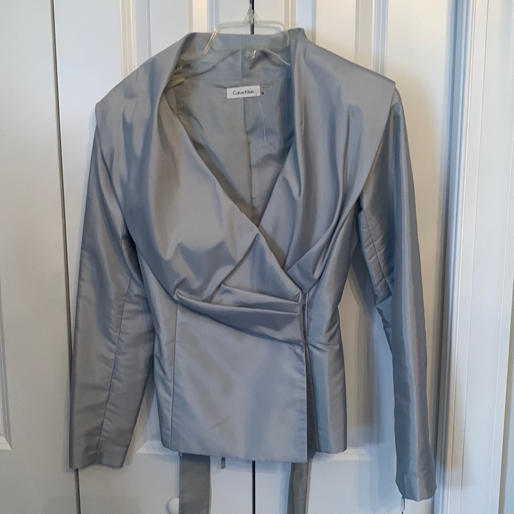 Calvin Klein new with tags. Great for a wedding.